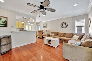 Seamless living: our open concept space merges living, kitchen, and dining areas effortlessly.