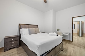 Bedroom 1 - Cozy and comfortable bed with dedicated workspace.