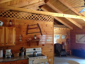 Kitchen/Loft
(Latticework surrounding loft has been replaced; see other photos)