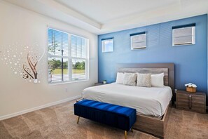 Deluxe Bedroom of the Townhouse in Kissimmee Florida - Comfy King Size Double Bed  - Spacious bedroom offering comfort and style - En-suite bathroom for privacy - Elegant wall decor