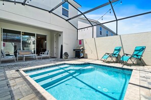 Stunning Private Pool and BBQ grill of the Townhouse in Kissimmee Florida - Relax by the shimmering poolside oasis - Experience ultimate relaxation in poolside paradise