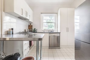 Cooking meals at home is effortless. In the kitchen there is ample bench preparation space, a stove and rangehood, large oven and dishwasher.