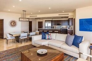 Diamante Ocean Club Residence OCR 305 Living Room with Ocean, Beach, and Sunset Views