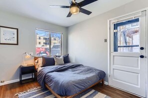 One of two bedrooms with a queen-sized bed