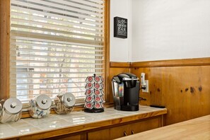 Attention all coffee lovers, enjoy the fully stocked coffee bar complete with a Keurig and K-cups.