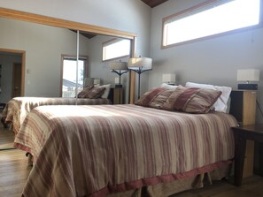 Main floor bedroom with queen bed.