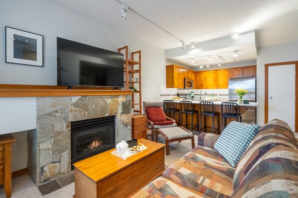Large flat-screen TV for your entertainment and gas fireplace for cozy nights.