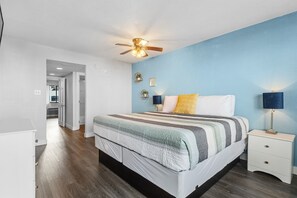 Coastal dreams await in our chic oceanview suite's cozy bedroom!