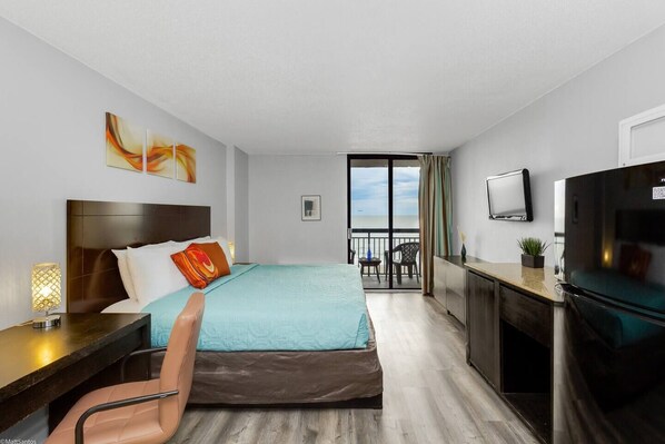 BOOK NOW!! This suite is designed with your comfort in mind, featuring a king-sized bed and a flat-screen TV for ultimate relaxation.