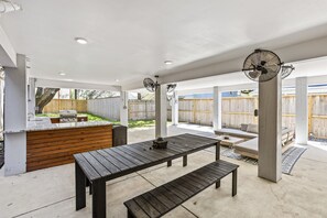 Enjoy a BBQ party or just relax on our large, covered patio with ceiling fans galore.