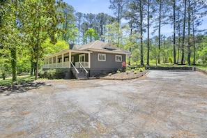 Cottage A (Big House) with lots of driveway parking.