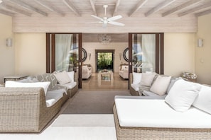 Features a seamless open-plan layout that blurs the lines between indoor and outdoor living spaces