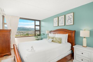 Have a restful night's sleep in your bedroom with a queen-size bed and mountain views!