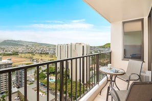 Have morning coffee on your balcony with this mountain view.