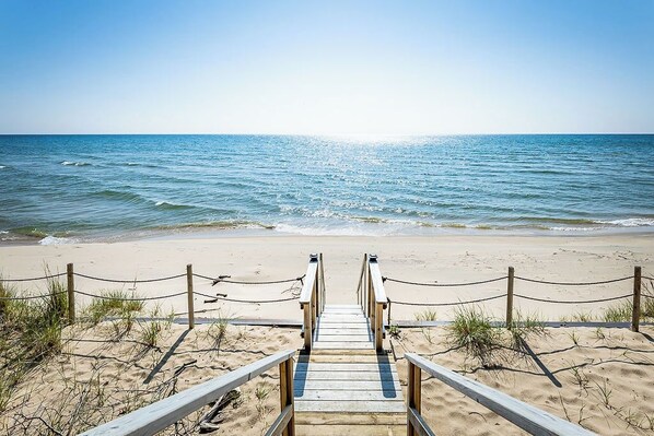 You are just steps away from your private beach on the shores of Lake Michigan.