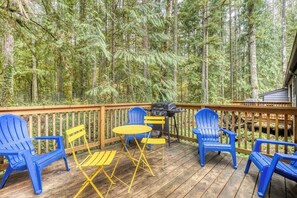 Private deck with outdoor furnishing and a BBQ grill