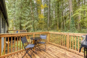 Enjoy your morning coffee outdoors surrounded by nature—peaceful views, fresh air, and the perfect start to your getaway at our serene retreat.