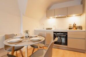 The Open Plan Living Space: gather round the dining table for an evening of fun and socialisation.