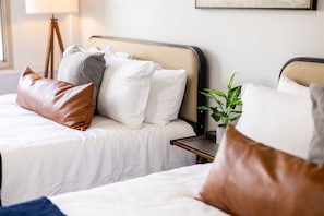 You and your guests will love the spaciousness and comfort of this room, with two luxurious queen beds and thoughtful décor to make you feel right at home.
