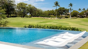 Lounge poolside with views of the Campion Hapuna Golf Course