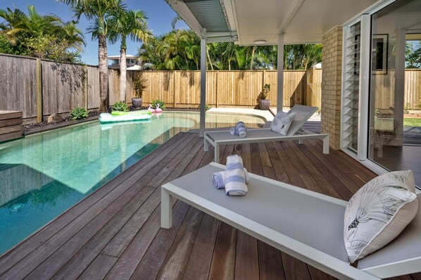 Lounge by the pool and relax