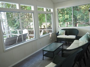 OVERALL:  The enclosed porch that provides great views of the lake and lots of wonderful sunlight!