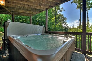 Soak all your worries away in the hot tub at this spectacular North Georgia Cabin Rentals