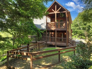 Large fenced area at this pet-friendly cabin rental 