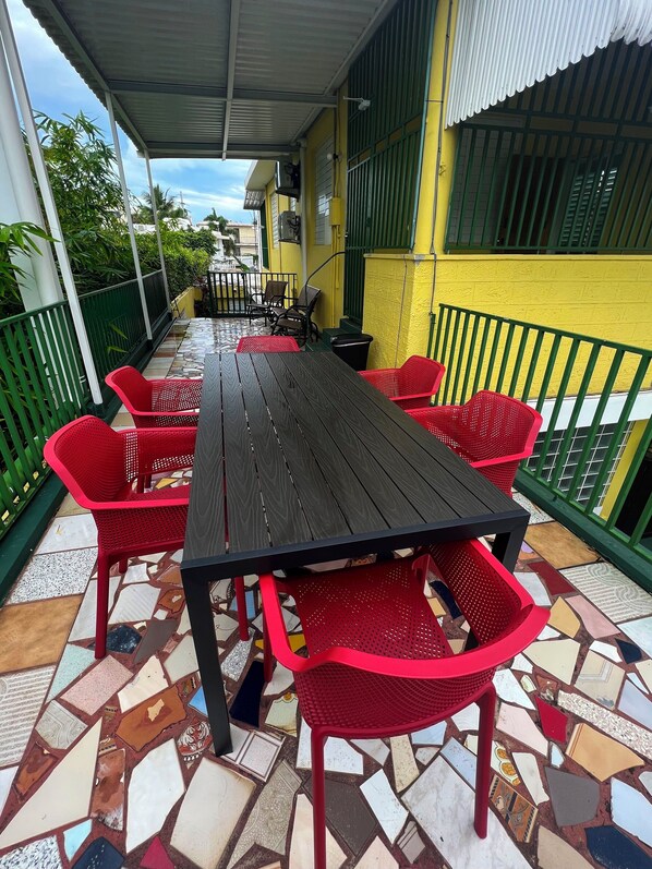 Large front balcony with plenty of seating space.