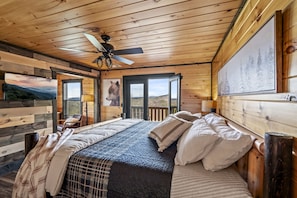 2nd floor master bedroom- full bath, stylish workspace/seating, and private deck