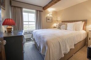 Jenny Wren Cottage, Middleham: Master bedroom with delightful soft furnishings
