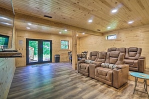 Gather around our rustic wooden table for a meal or game night, and kick back in the reclining theater chairs for a movie, all in a space that's perfect for making memories.