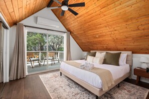 Upstairs Master Bedroom with King Bed, Balcony, and Private Attached Bathroom