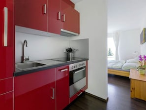Cabinetry, Countertop, Furniture, Property, Kitchen Sink, Sink, Tap, Kitchen, Orange, Wood
