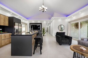 Effortless meal preparation meets sleek design in our modern kitchen, where cooking becomes a pleasure, not a chore