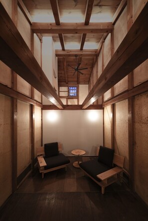 You can watch movies in the Kura Lounge. Relax on the Hida furniture sofas while drinking sake or tea.