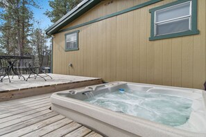 Picture yourself nestled in the soothing embrace of warm, bubbling waters, a sanctuary of relaxation awaiting you as you step into the inviting haven of an Airbnb hot tub.