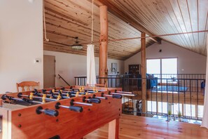 Enjoy a game of foosball in the loft area