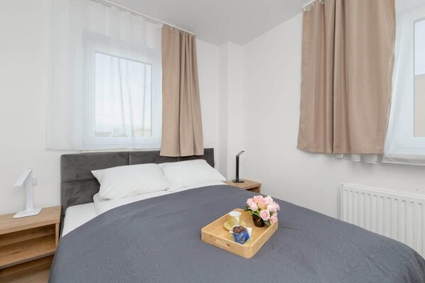 Bedroom with a comfortable double bed.