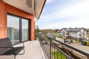 Balcony with garden furniture.