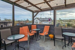 Furnished terrace/patio.