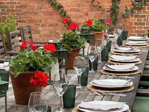 The eating area outside which is conveniently adjacent to the kitchen 
