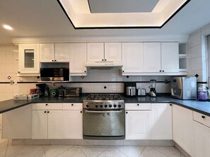 There’s a fully equipped kitchen with quality appliances and everything you need to prepare your favorite meals