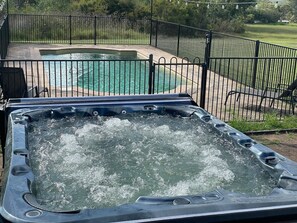 You private swimming pool with huge hot spa and bindi free kids play area with fire pit 