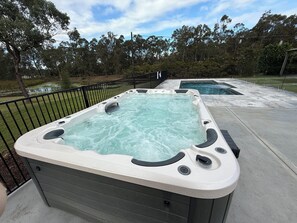The 10 person spa is perfect for those cold nights sit in the hot tub and relax with the firepit burining in the back ground.