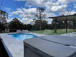 Private self cleaning refreshing salt water pool only for your group is next to the huge hot spa 