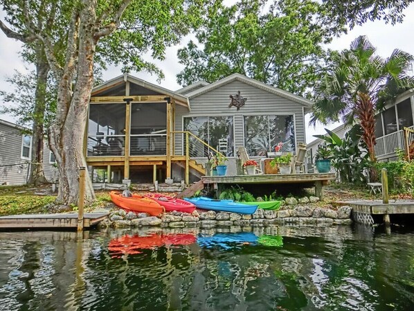 Relax on the peaceful deck overlooking the Turtles!