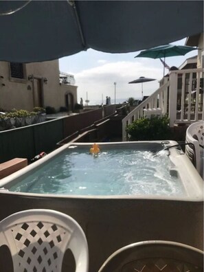 Jacuzzi with ocean , beach and boardwalk views!  Shared.
