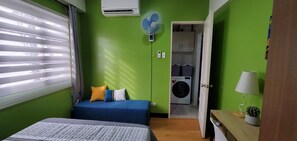 View from the bed with bench