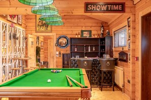 log cabin with pool table